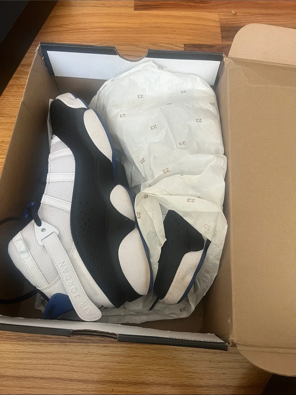 Jordan Retro High-Top Sneakers in Black, White & Blue